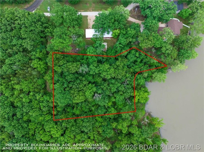 Large Lake Front Lot with 230 ft of Lake Front and 1.3 Acres - photo 7