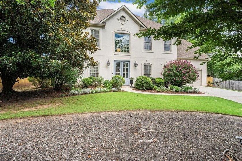 Freshly repositioned with a substantial price improvement, this - photo 2