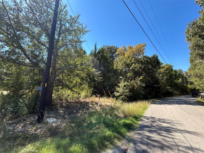 Discover the opportunity to own two adjoining corner lots in the - photo 3