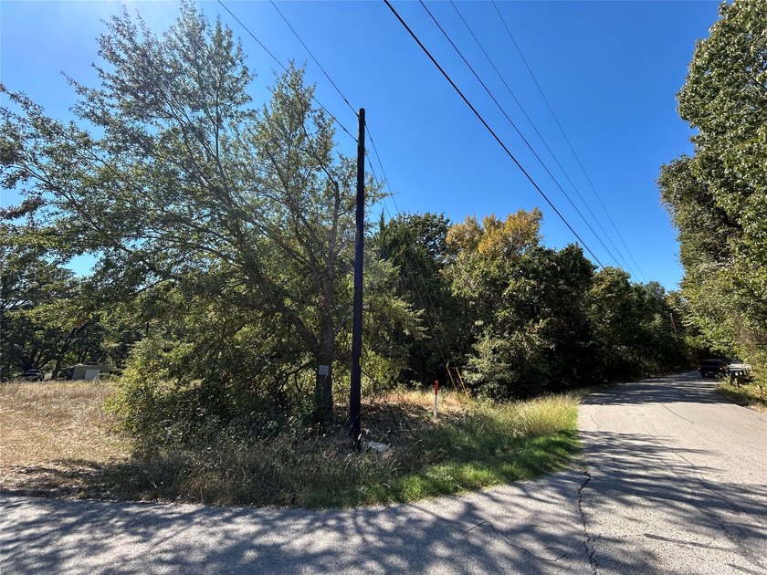 Discover the opportunity to own two adjoining corner lots in the - photo 5
