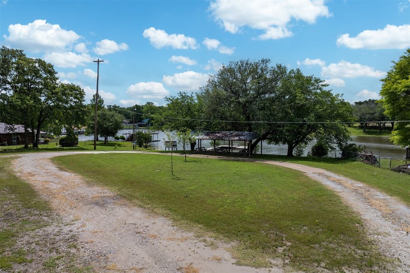 Discover the opportunity to own two adjoining corner lots in the - photo 8