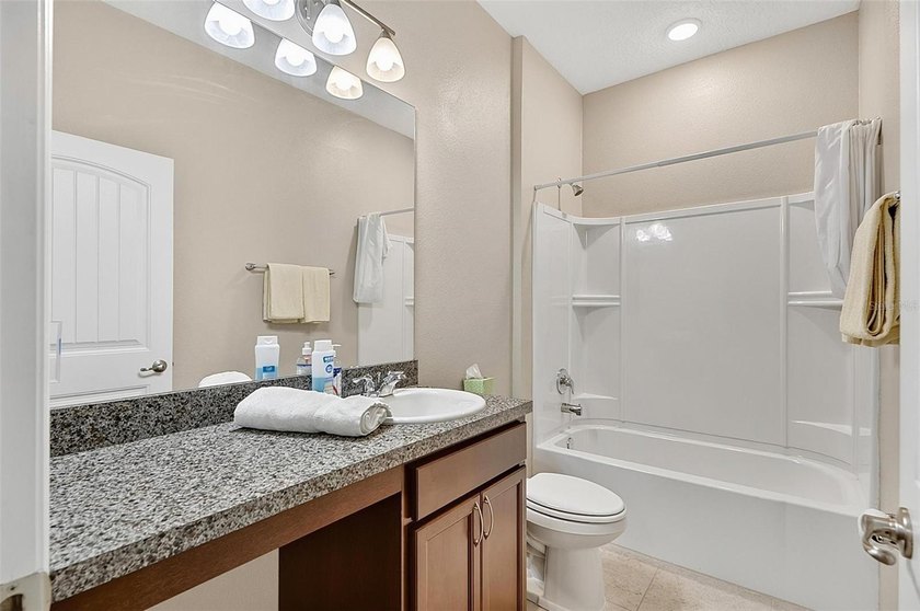 Better than new! Open concept 4 bedroom 3 bath 3 car garage home - photo 22