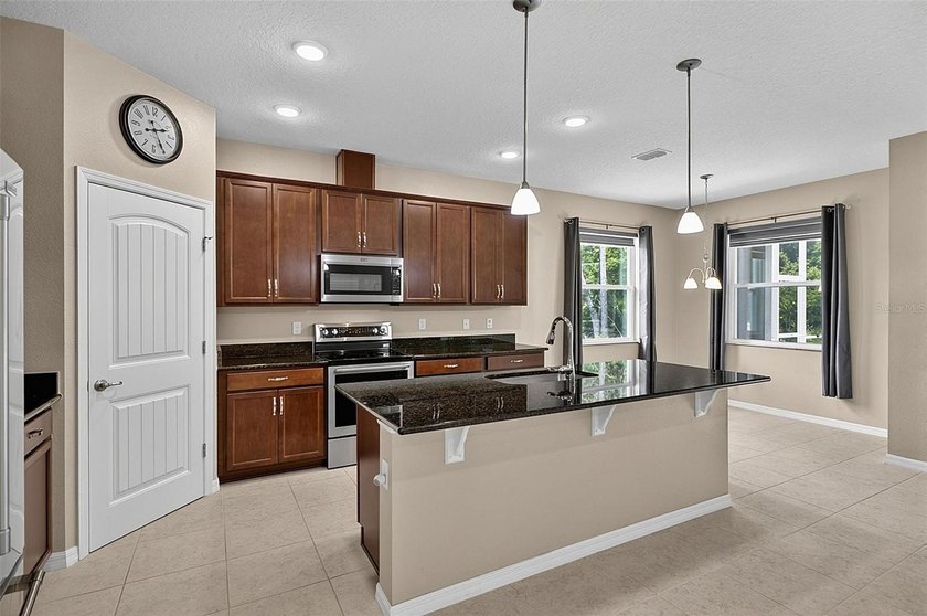 Better than new! Open concept 4 bedroom 3 bath 3 car garage home - photo 29