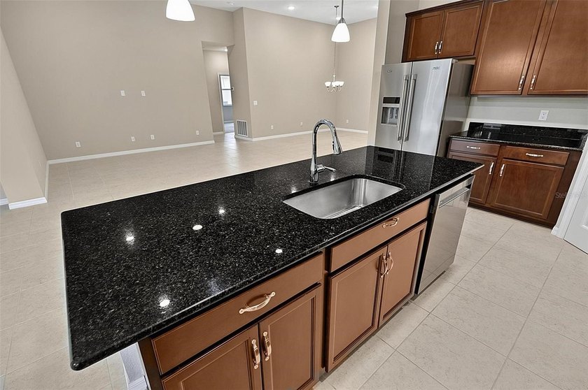 Better than new! Open concept 4 bedroom 3 bath 3 car garage home - photo 30