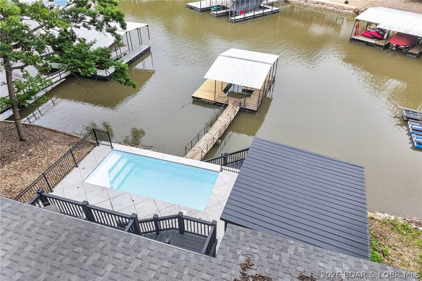 LAKE LIVING AT ITS FINEST! Spectacularly remodeled waterfront - photo 2
