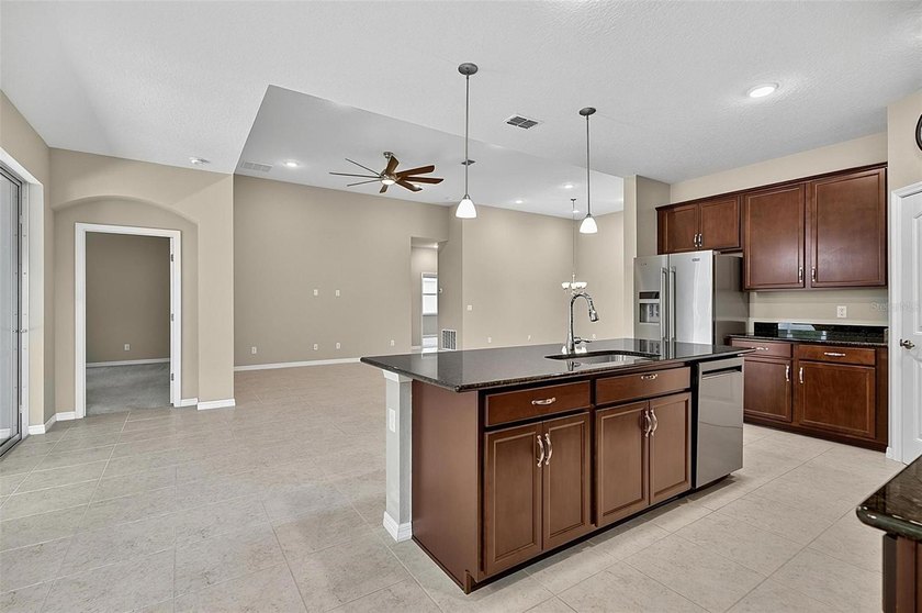 Better than new! Open concept 4 bedroom 3 bath 3 car garage home - photo 39