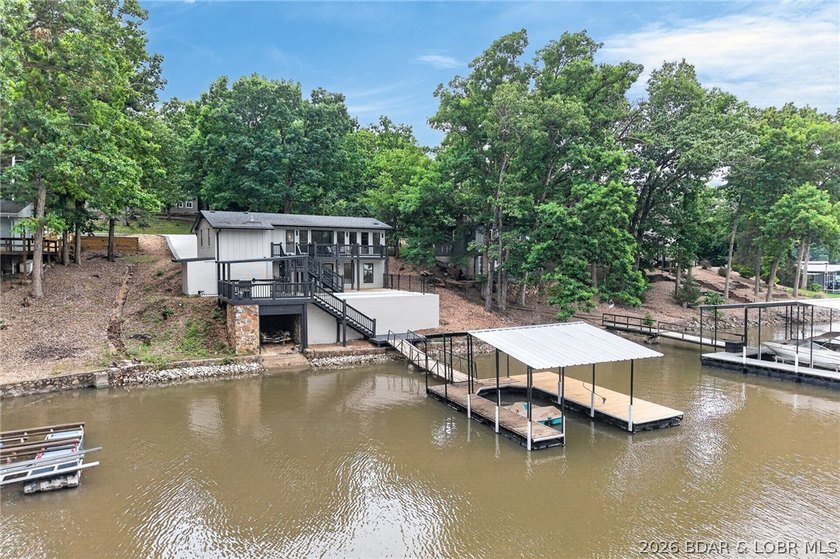 LAKE LIVING AT ITS FINEST! Spectacularly remodeled waterfront - photo 10