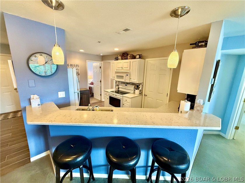 Experience lake life at its finest in this stunning condo - photo 9