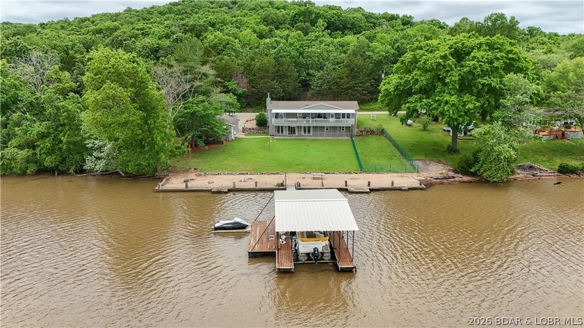 Experience the ultimate Lake of the Ozarks lifestyle with this - photo 2