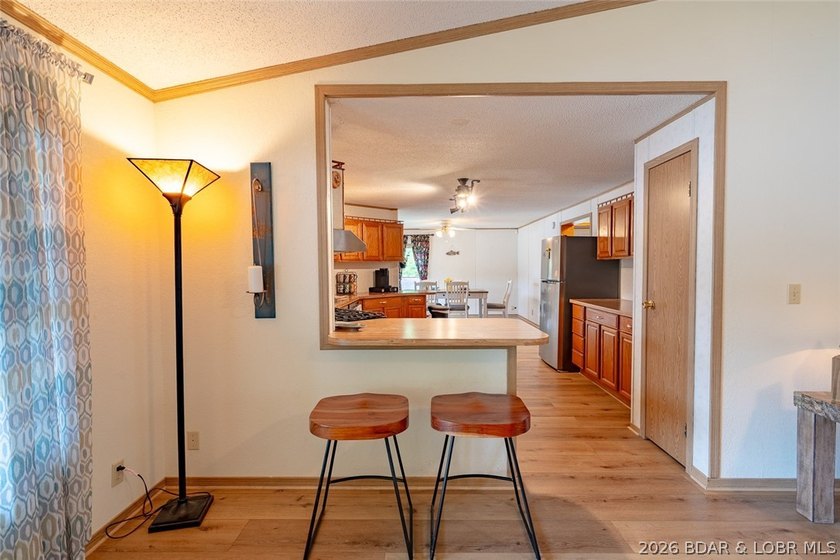 Experience the ultimate Lake of the Ozarks lifestyle with this - photo 7