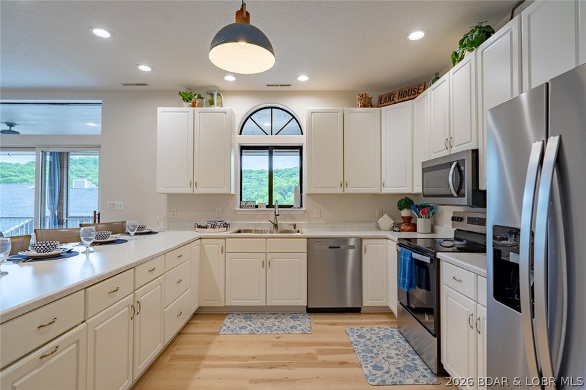 Beautifully updated top floor end unit at Lazy Days in Osage - photo 9