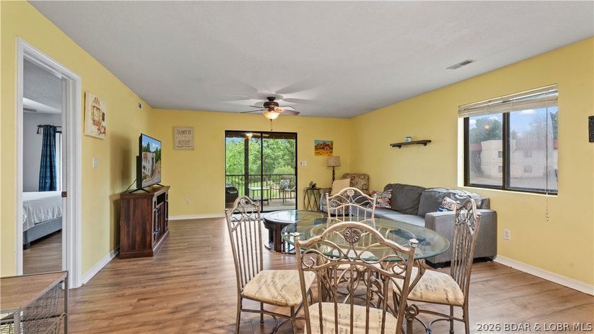 Welcome home to the Osage Vista's community. This top floor unit - photo 2