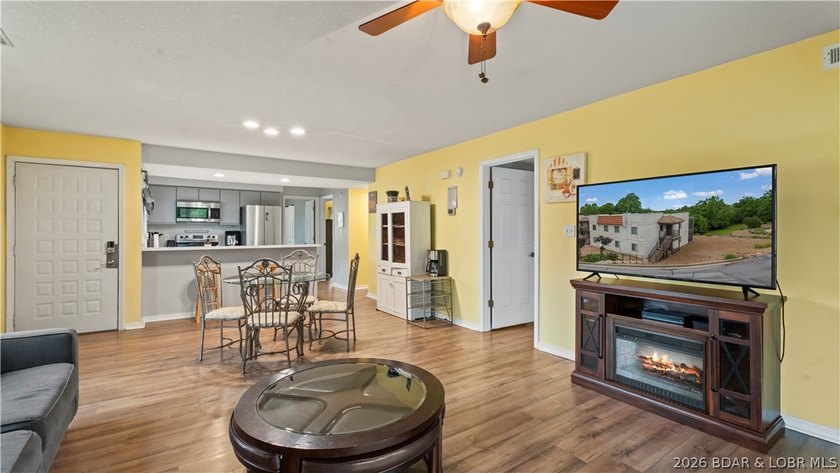 Welcome home to the Osage Vista's community. This top floor unit - photo 4