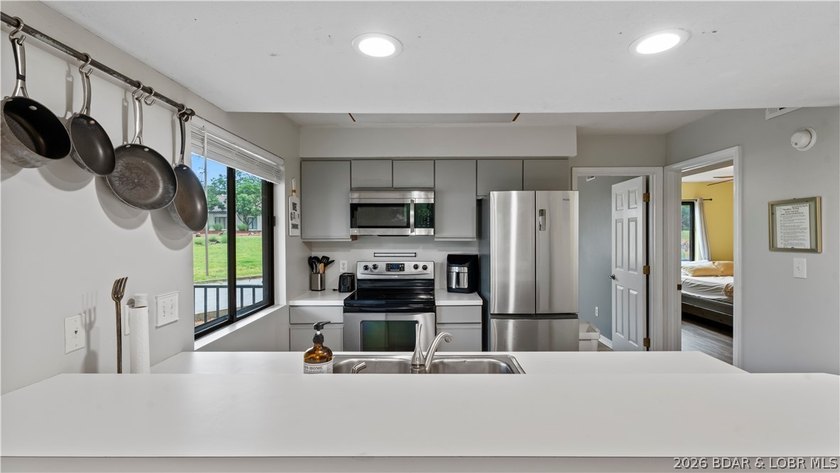 Welcome home to the Osage Vista's community. This top floor unit - photo 6