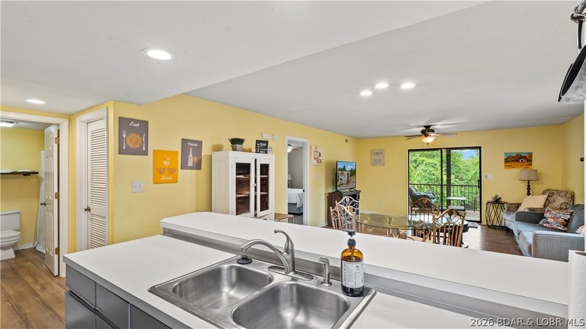 Welcome home to the Osage Vista's community. This top floor unit - photo 8