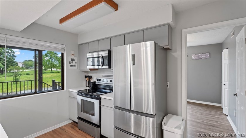Welcome home to the Osage Vista's community. This top floor unit - photo 10