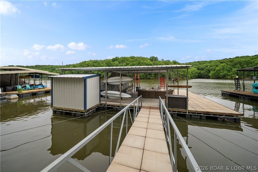 Discover a rare opportunity to own a truly distinctive lakefront - photo 2