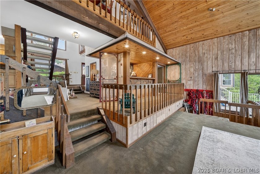 Discover a rare opportunity to own a truly distinctive lakefront - photo 9