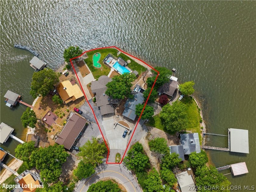 This rare Lake of the Ozarks investment opportunity features TWO - photo 2