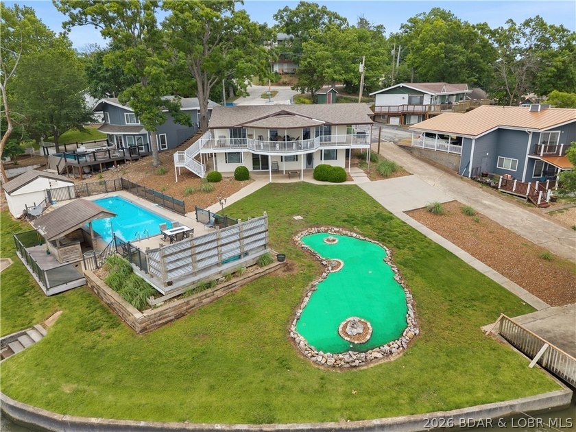 This rare Lake of the Ozarks investment opportunity features TWO - photo 4