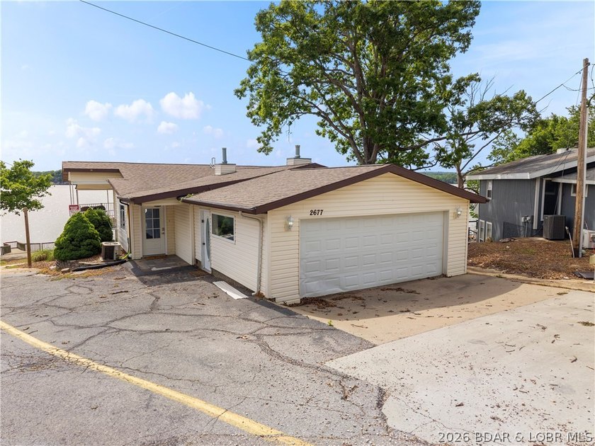 This rare Lake of the Ozarks investment opportunity features TWO - photo 8
