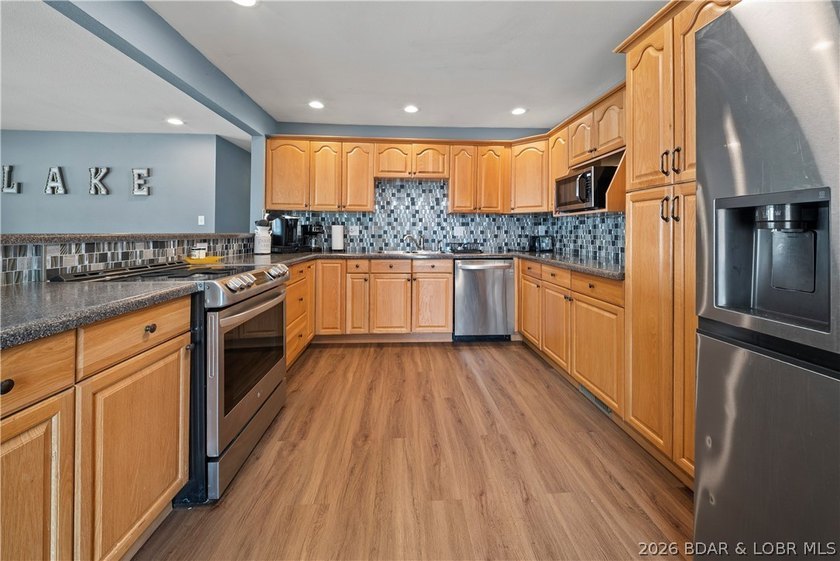 This rare Lake of the Ozarks investment opportunity features TWO - photo 10