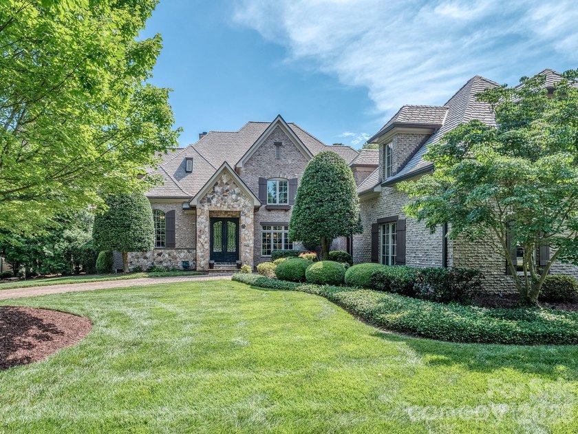 Welcome to luxury living in the prestigious, gated enclave of - photo 3