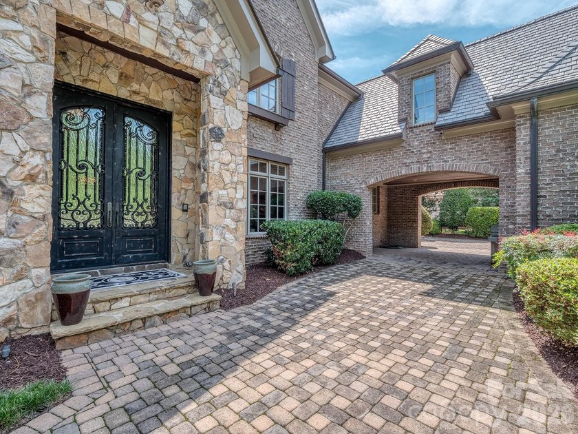 Welcome to luxury living in the prestigious, gated enclave of - photo 4