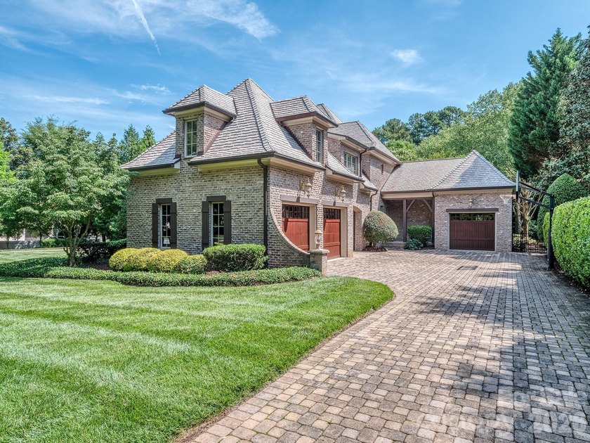 Welcome to luxury living in the prestigious, gated enclave of - photo 5