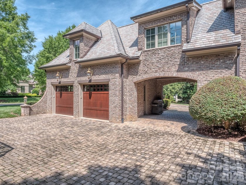 Welcome to luxury living in the prestigious, gated enclave of - photo 6