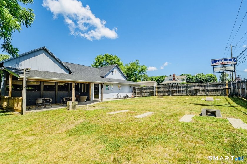 An exceptional opportunity to own both a successful, established - photo 4