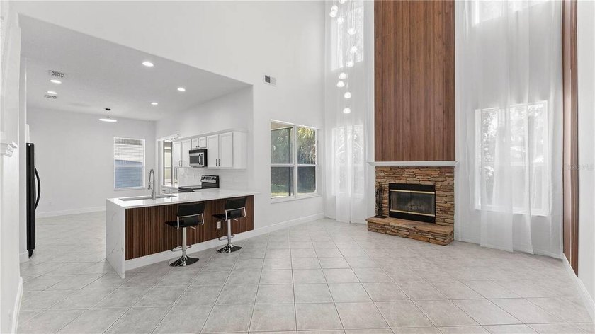 A beautiful, fully remodeled home featuring a new roof and new - photo 11
