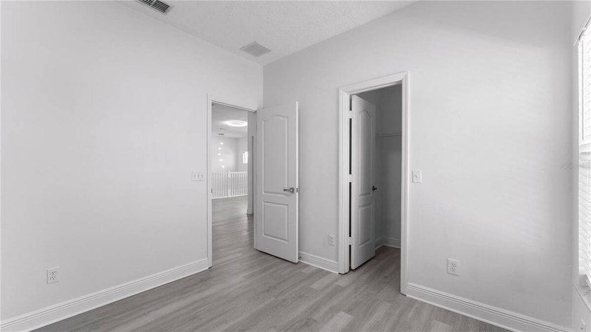 A beautiful, fully remodeled home featuring a new roof and new - photo 24