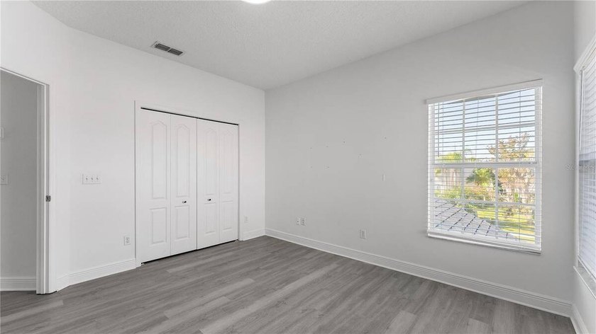 A beautiful, fully remodeled home featuring a new roof and new - photo 26