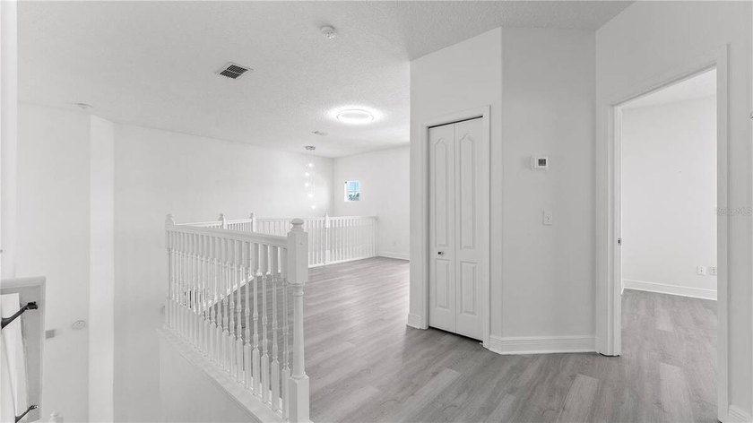 A beautiful, fully remodeled home featuring a new roof and new - photo 30