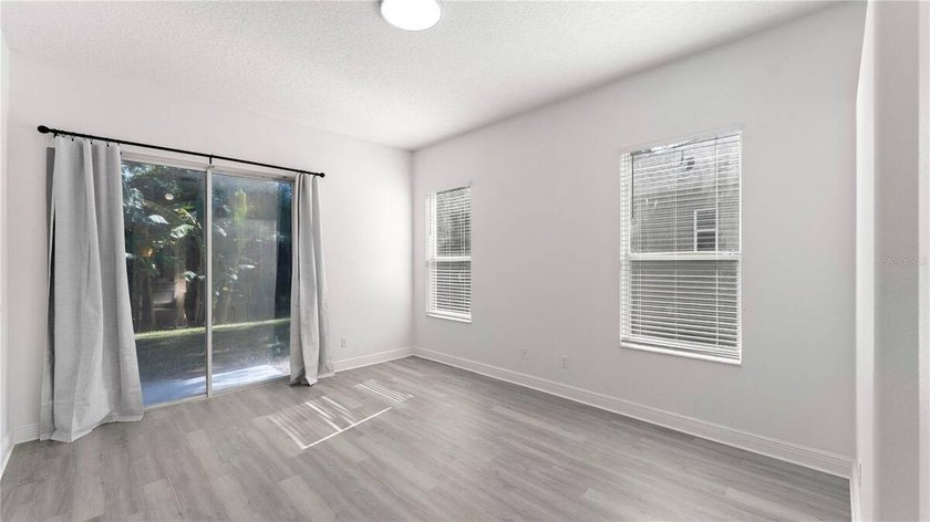 A beautiful, fully remodeled home featuring a new roof and new - photo 35