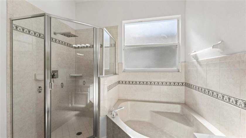 A beautiful, fully remodeled home featuring a new roof and new - photo 38