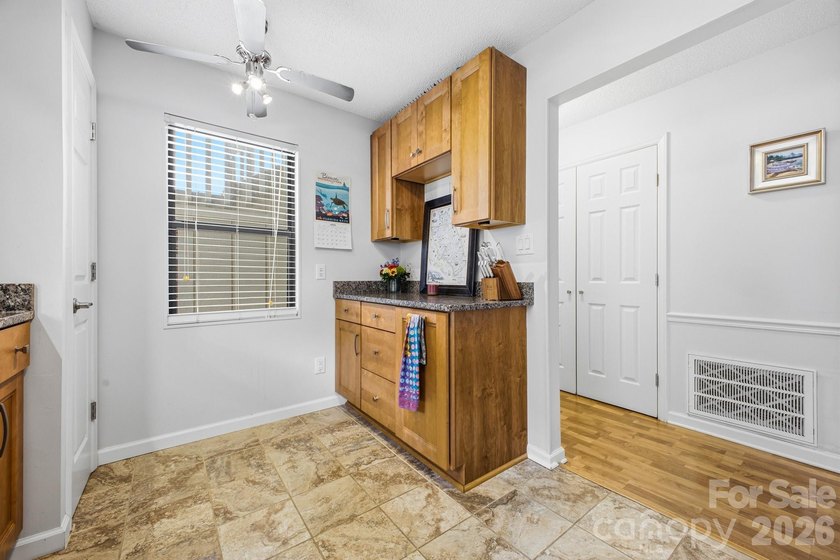 This highly coveted lower-level end unit in the Cloisters - photo 7