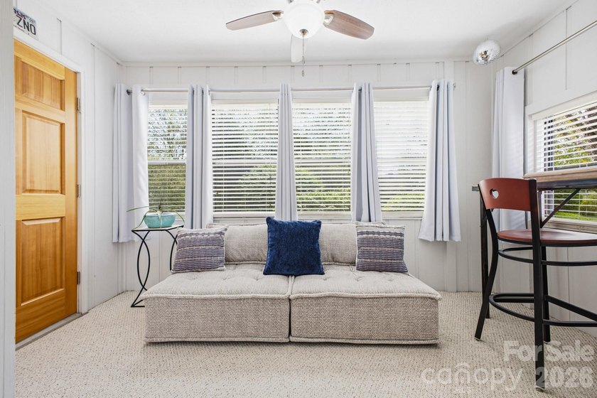 This highly coveted lower-level end unit in the Cloisters - photo 10