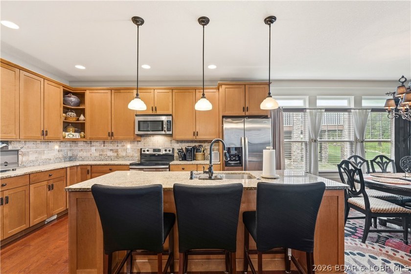 Located in a highly sought-after gated, golf cart-friendly - photo 5