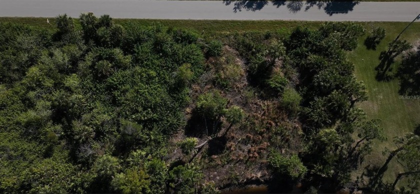 WATERFRONT LOT!! Just what you would expect from the Coastal - photo 3