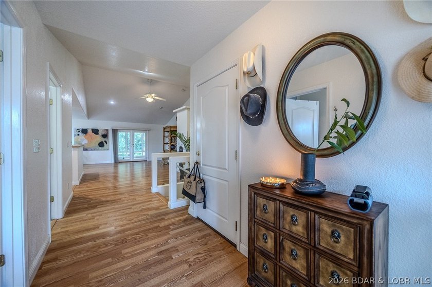 Welcome to this 4-bedroom, 3-bath lake-area-retreat with - photo 5