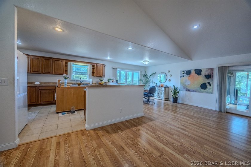 Welcome to this 4-bedroom, 3-bath lake-area-retreat with - photo 9