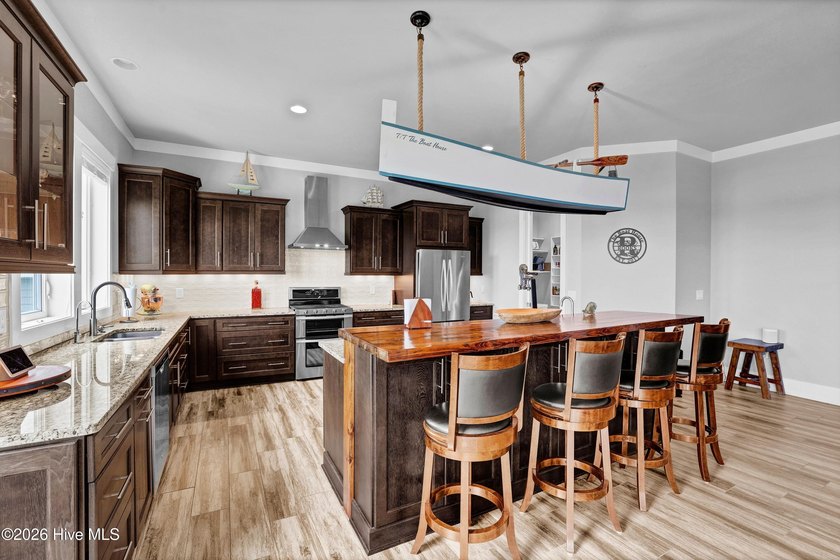 Enjoy a true waterfront boating lifestyle in this exceptional - photo 6