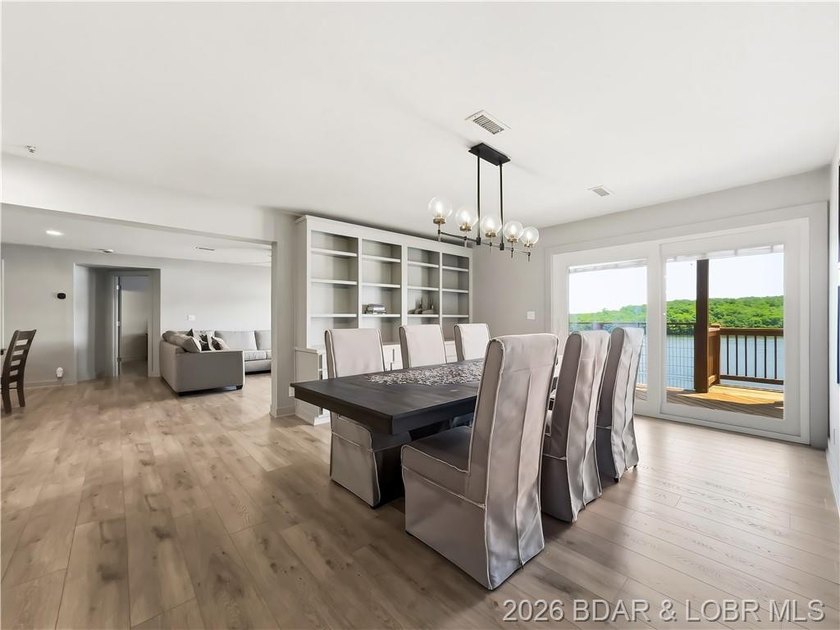 Turnkey luxury and breathtaking lakefront views await in this - photo 3