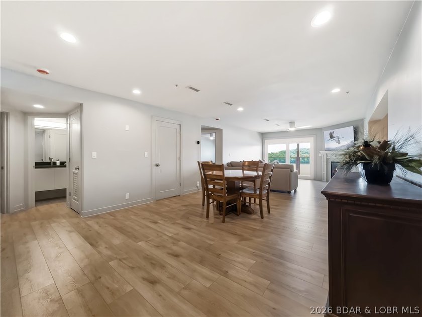 Turnkey luxury and breathtaking lakefront views await in this - photo 6