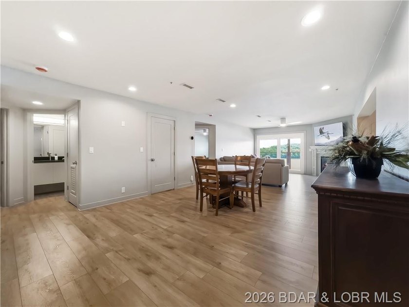Turnkey luxury and breathtaking lakefront views await in this - photo 6