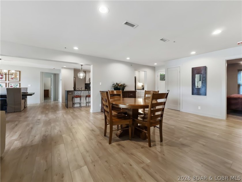 Turnkey luxury and breathtaking lakefront views await in this - photo 7