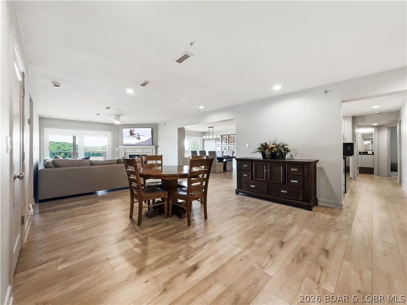 Turnkey luxury and breathtaking lakefront views await in this - photo 9