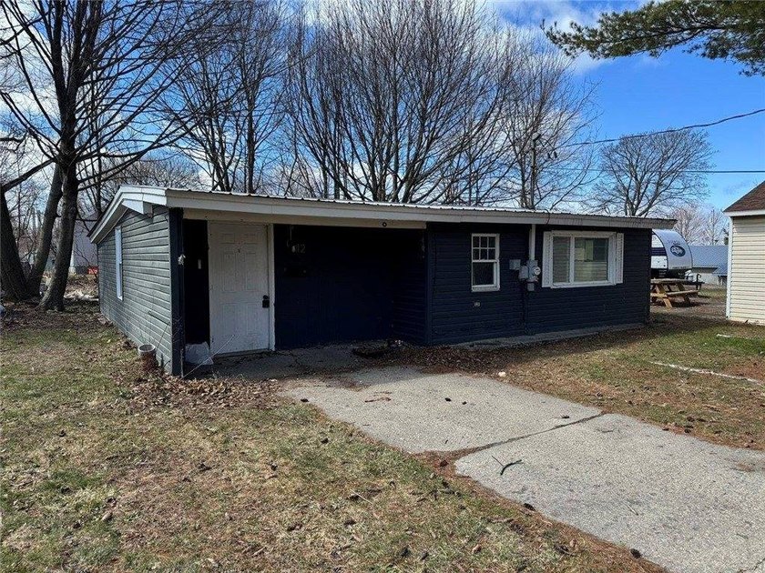 Welcome to this charming ranch-style home in Oswego, NY, ideally - photo 2